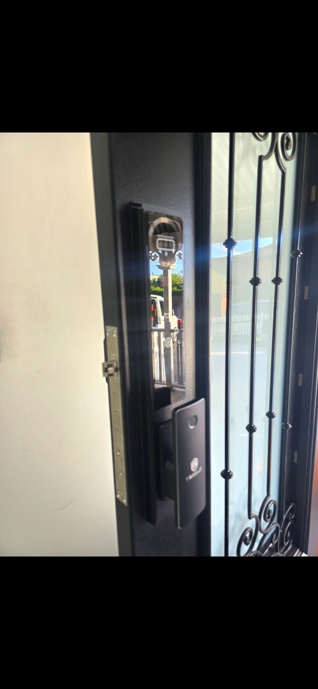 Security gate with digital keypad lock — commercial locksmith Rhodes